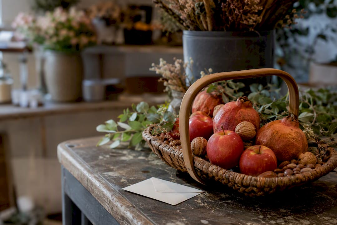 Modest fruit basket arranged for funeral gift