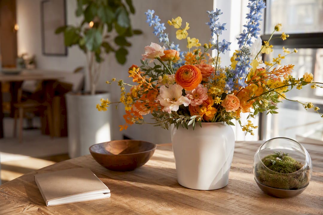 Large floral arrangement on office reception desk