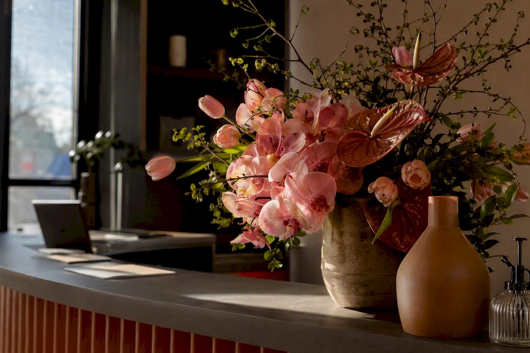 Office reception desk flower arrangement
