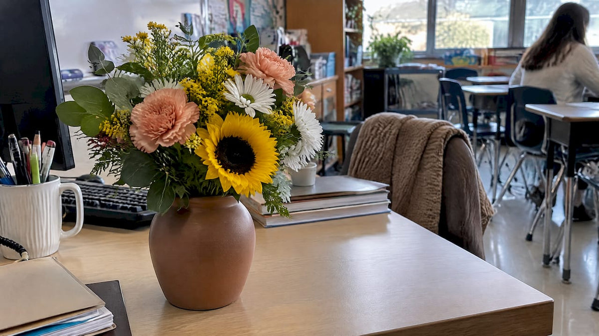 Compact teacher appreciation bouquet on classroom desk